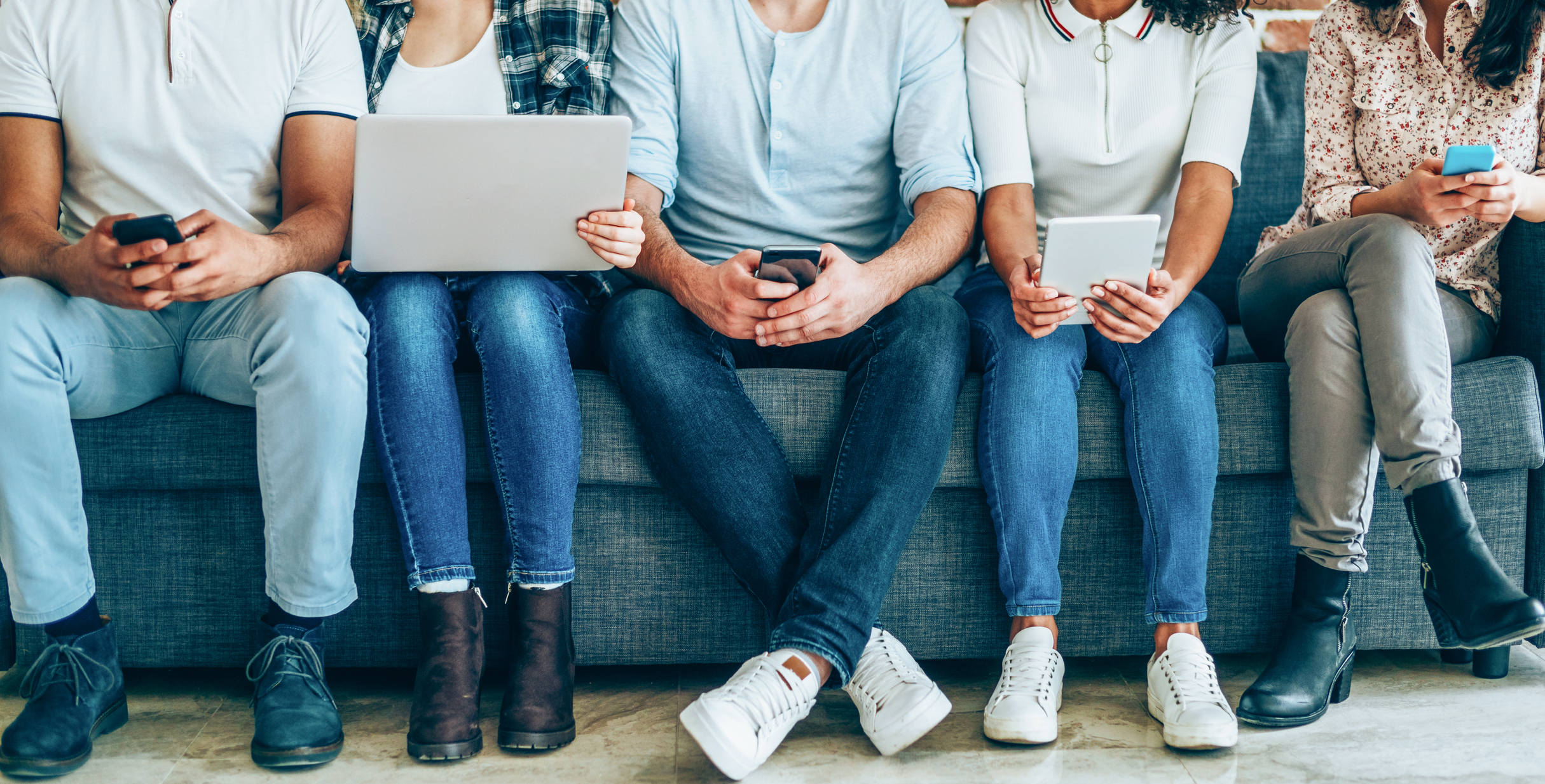 Group of young people with smart devices