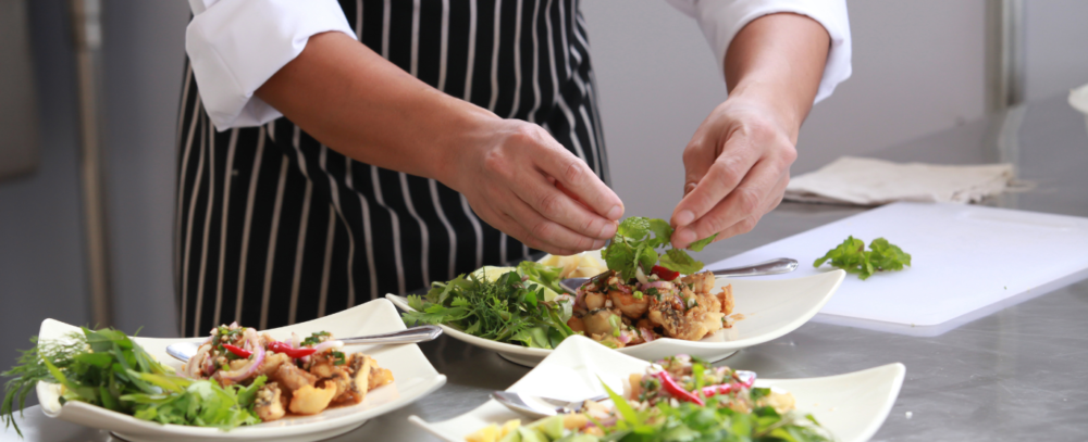 Chef Garnishing a Dish